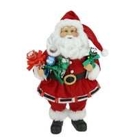 12 Дедо Мраз, држејќи ја декорацијата за божиќни таблети Tootsie
